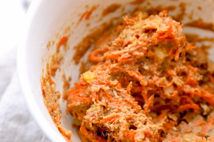 Carrot cake cupcake batter in a large mixing bowl.