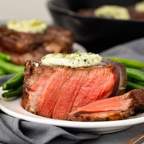 Sliced filet mignon on a white plate