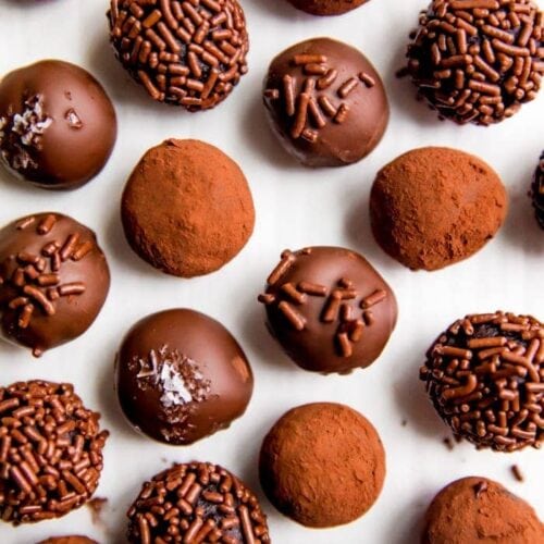 Several healthy vegan chocolate truffles shot overhead