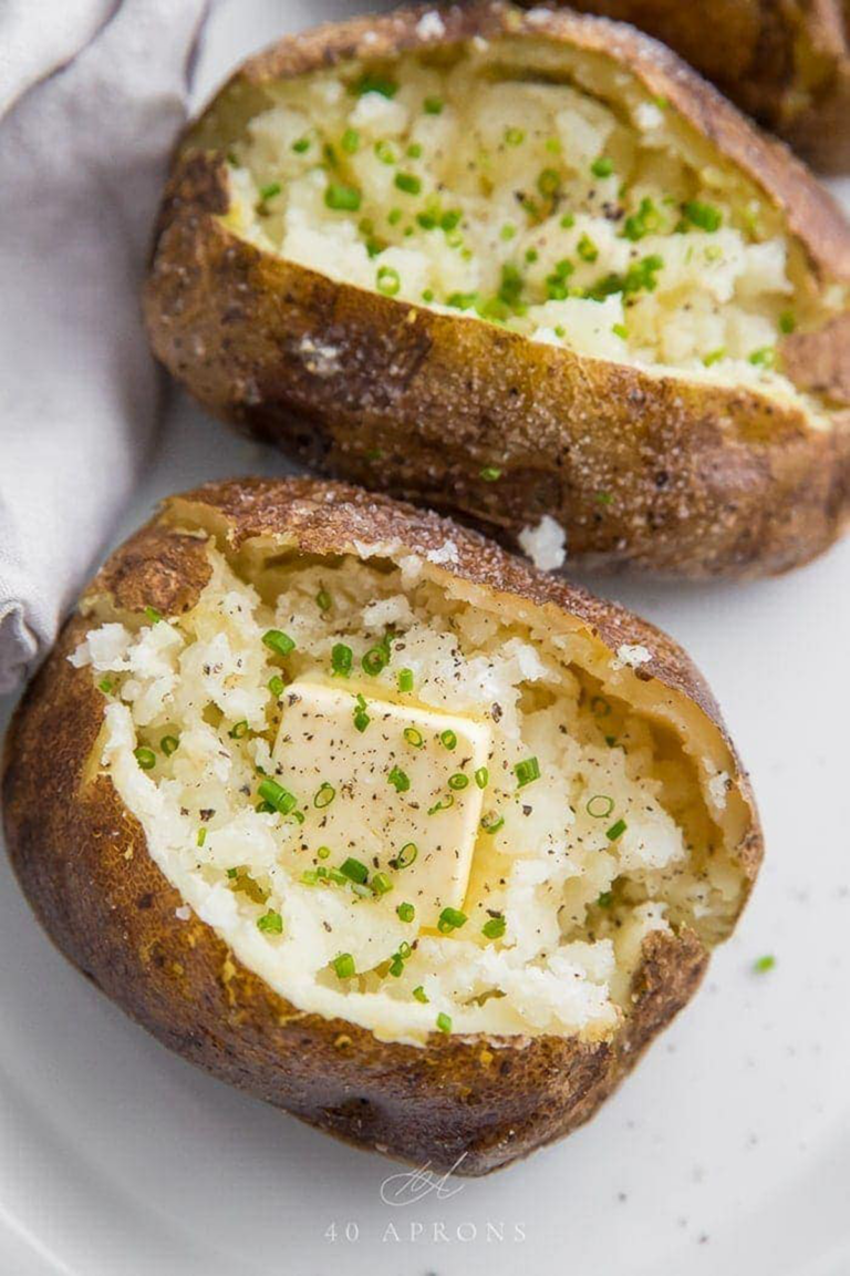 Baked potatoes on the grill.