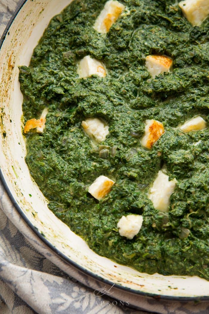 A skillet of palak paneer