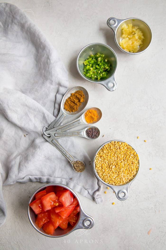 Ingredients to make the dish on a white work surface