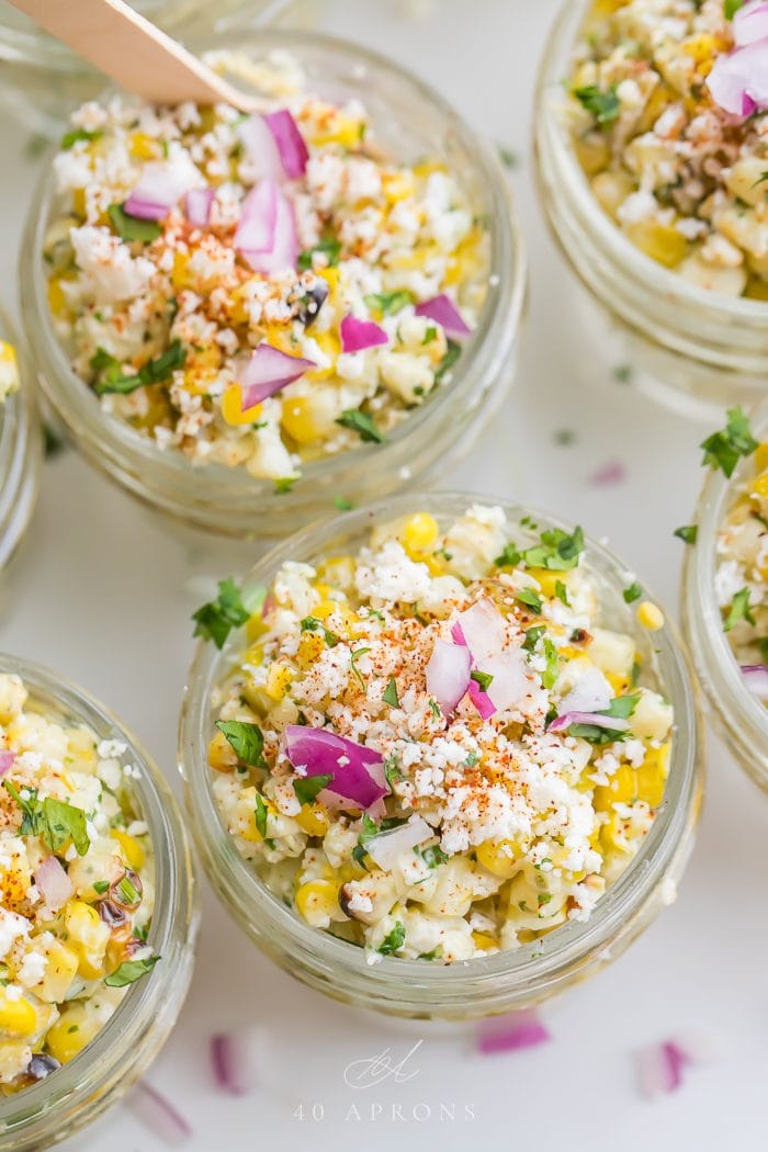 Top shot of mexican street corn in jars