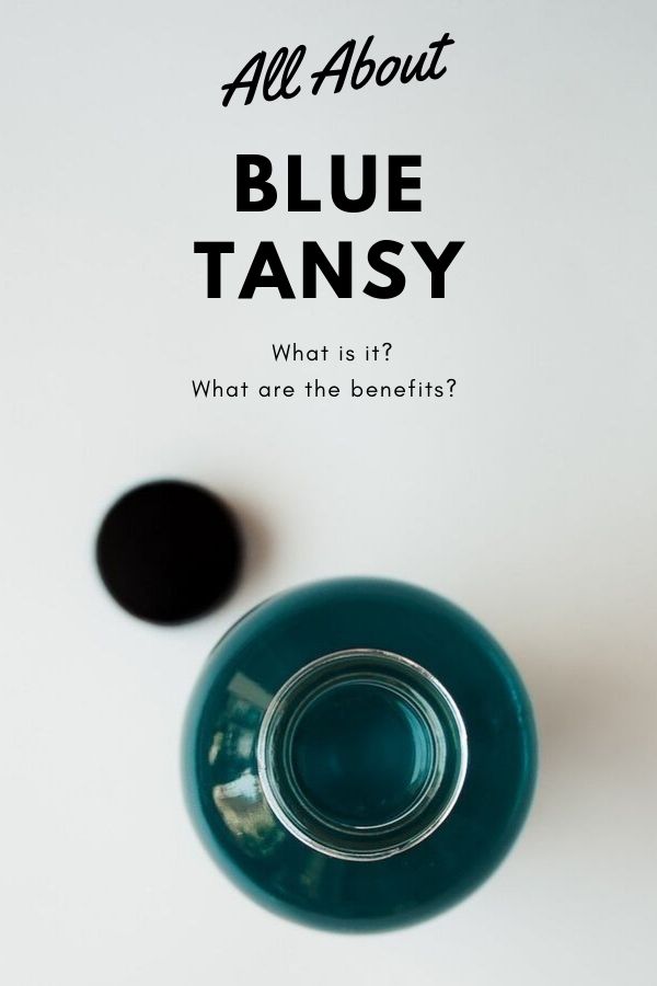 All About Blue Tansy Essential Oil Blog Graphic depicting a bottle with blue tansy body oil