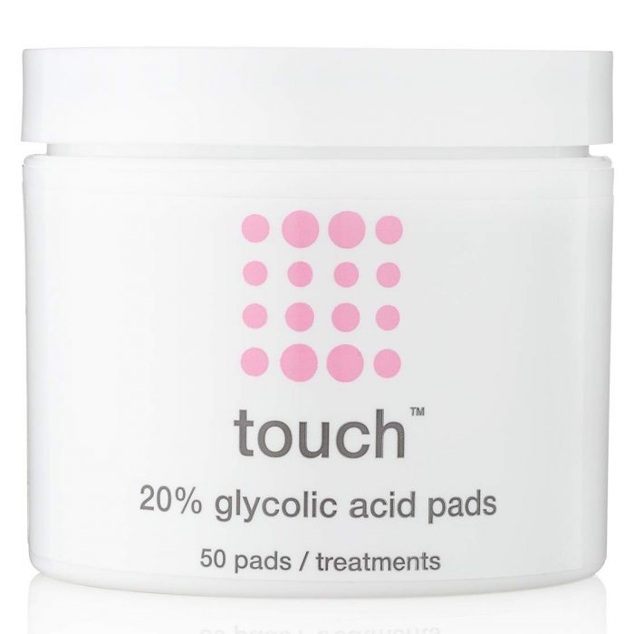 a container with glycolic acid exfoliation pads for acne plagued skin against white background