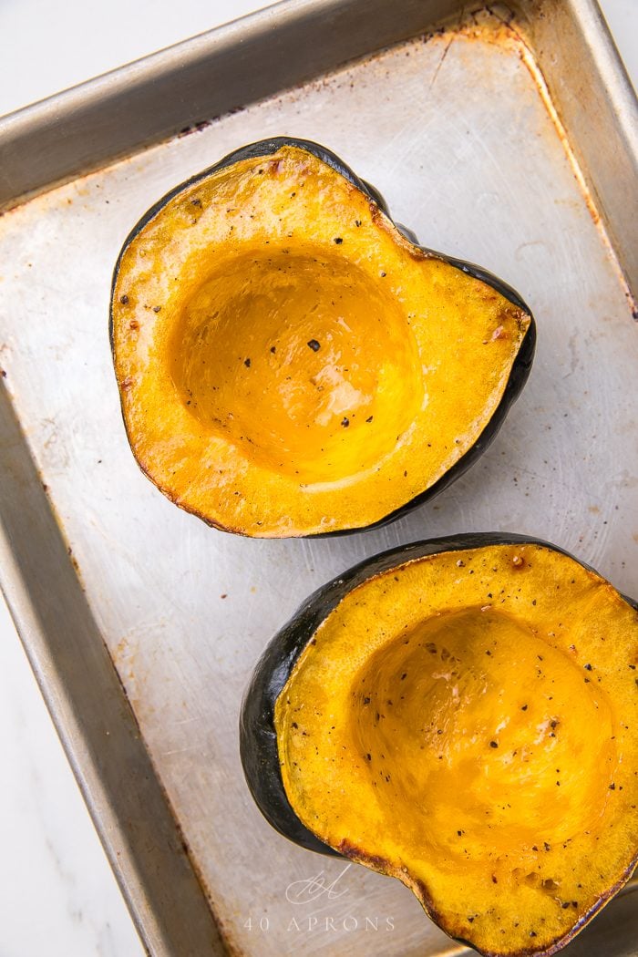 Two roasted halves of acorn squash