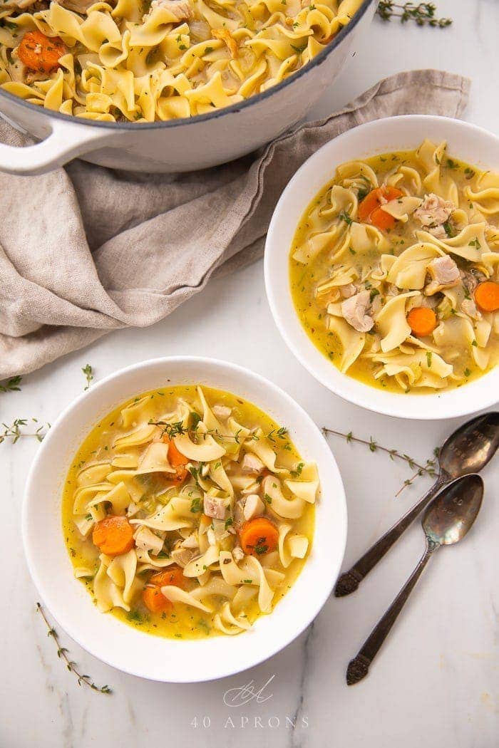 Two bowls of leftover turkey soup