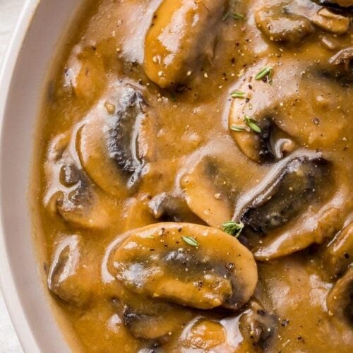 Mushroom gravy in a white bowl