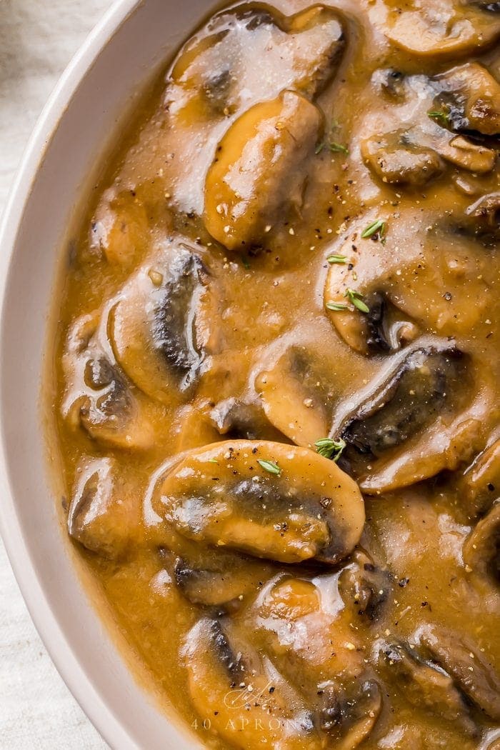 Mushroom gravy in a white bowl