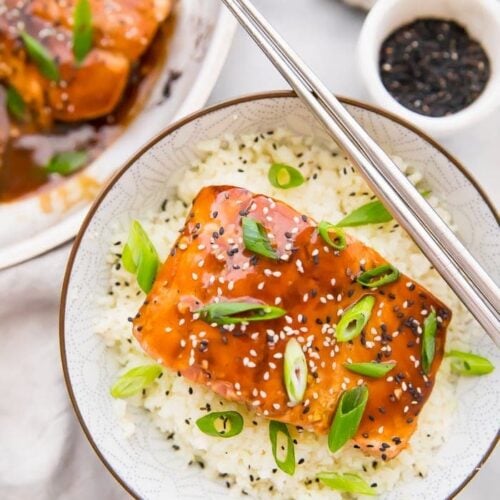 Teriyaki served in a bowl with cauliflower rice and chopsticks