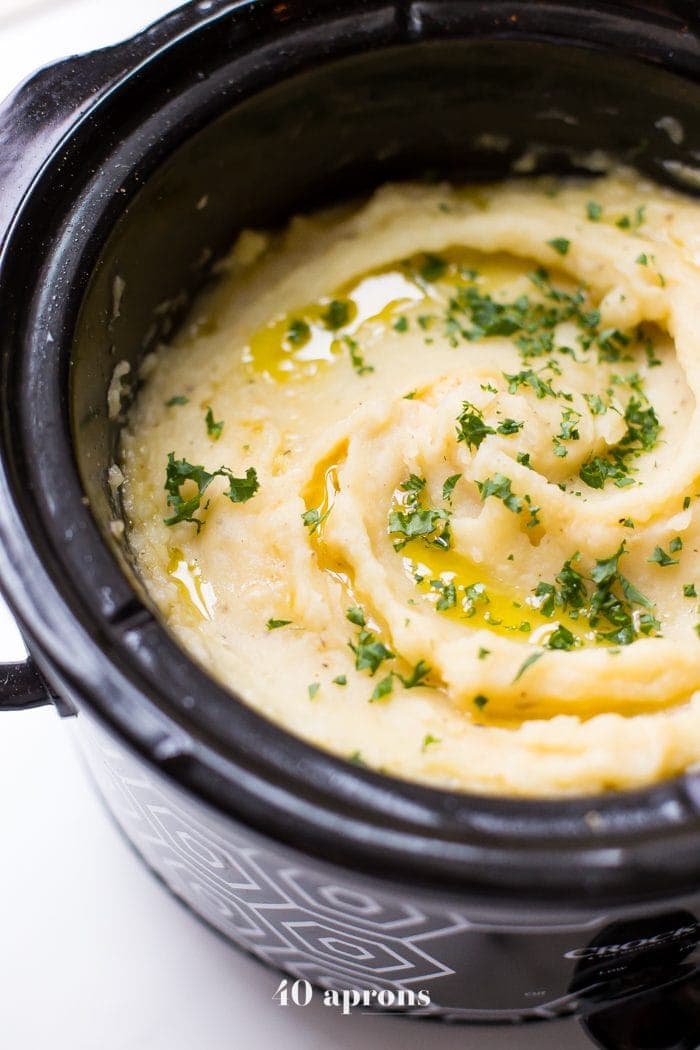 Whole30 mashed potatoes with parsley garnish