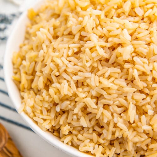 A large white bowl of brown rice cooked in the Instant Pot.