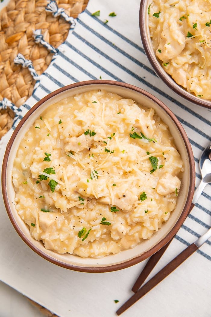 Two bowls of chicken and rice