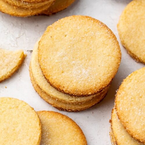 Keto shortbread cookies in stacks on a countertop