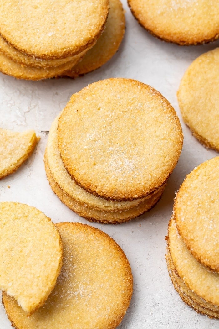 Keto shortbread cookies in stacks on a countertop