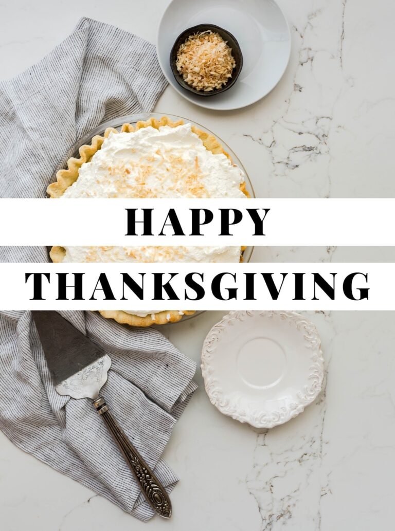 Graphic with black text reading Happy Thanksgiving against a white text background on top of a photo of pie on a marble countertop