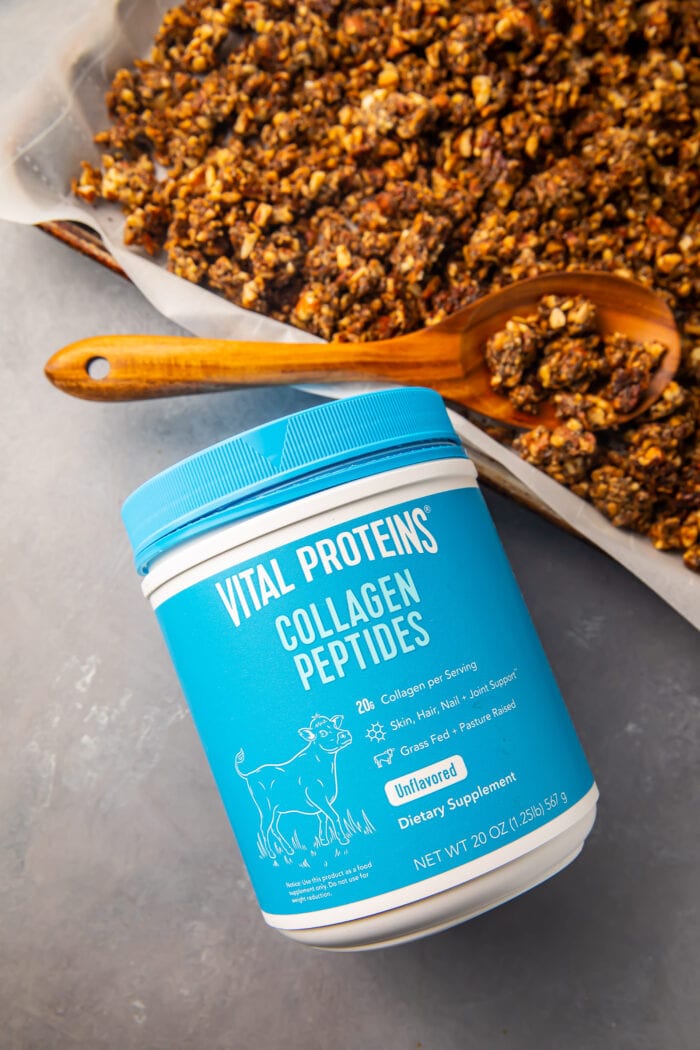 Vital Proteins collagen peptides container next to a sheet pan of keto granola