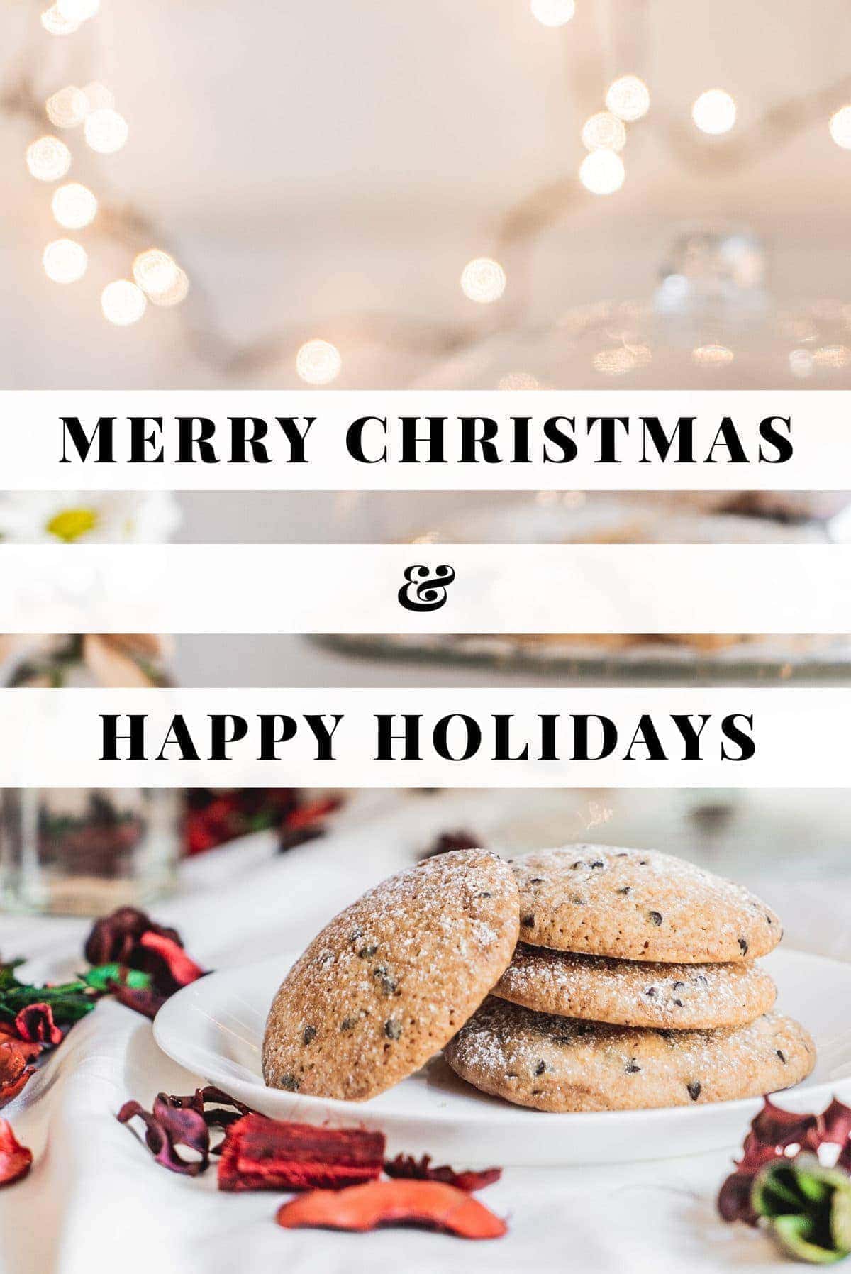 Merry christmas and happy holidays text over a Christmas tablescape with cookies and lights