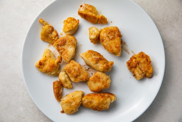 White plate of whole30 fried chicken nuggets