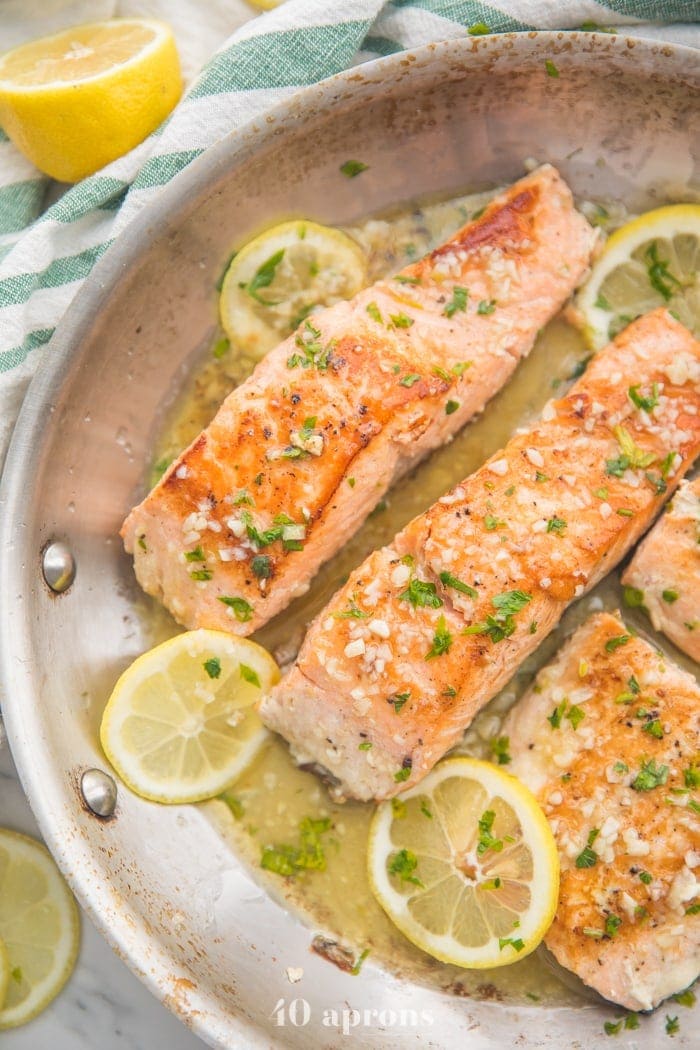 40 Aprons lemon garlic salmon in a saute pan