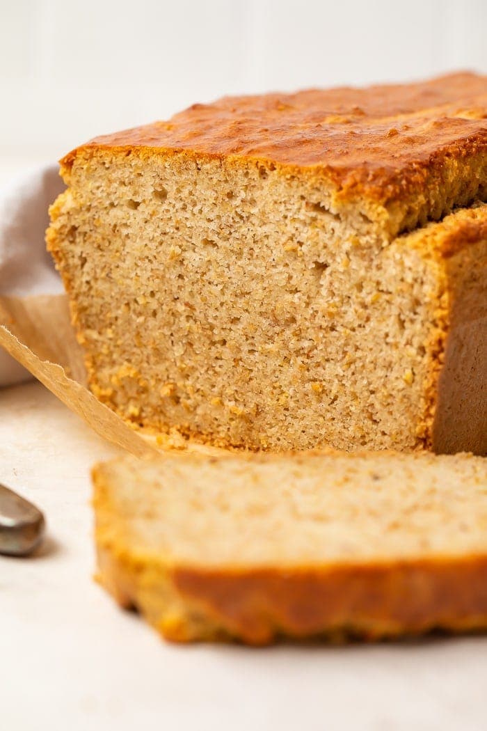 A loaf of paleo bread with the end of the loaf sliced off