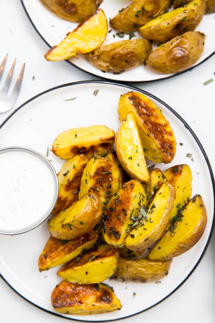 Paleo roasted rosemary potatoes on a white dish