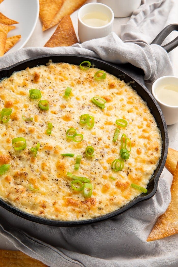 Crab rangoon dip in a cast iron skillet