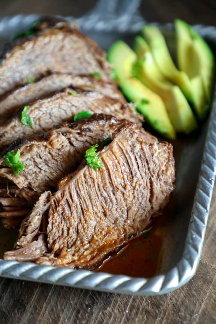 Close up of beef brisket on a metal pan