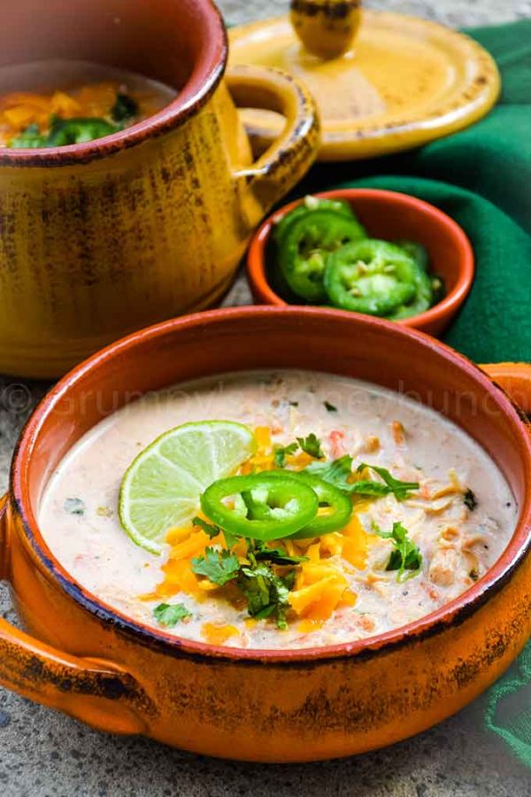 Chicken taco soup in glazed soup bowls