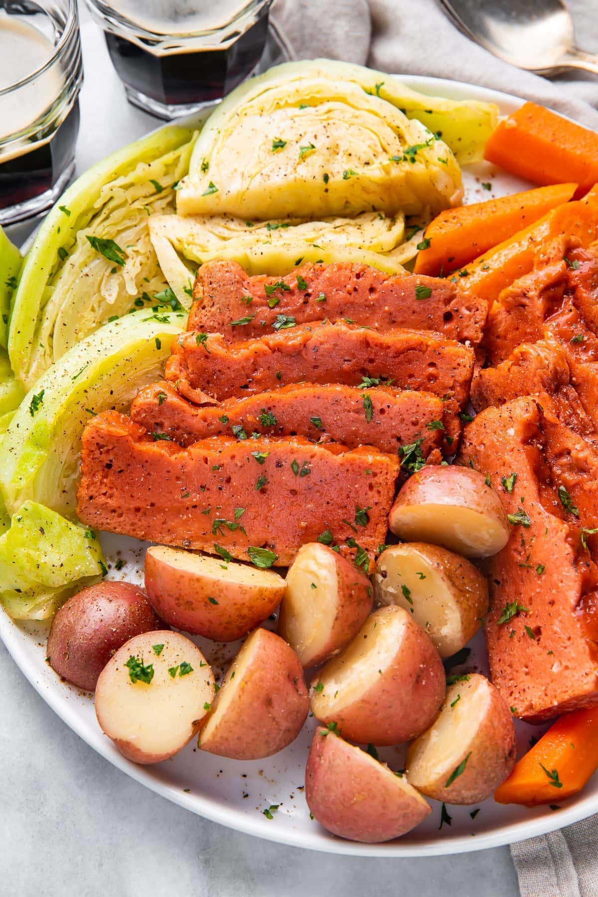 Close up view of vegan corned beef and cabbage with potatoes