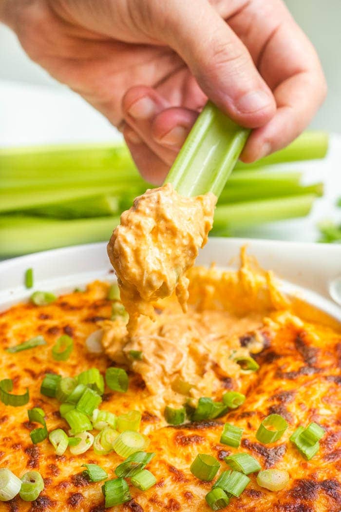 Buffalo chicken dip with celery stalks