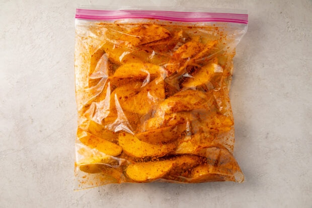 Wedges and seasonings in plastic bag