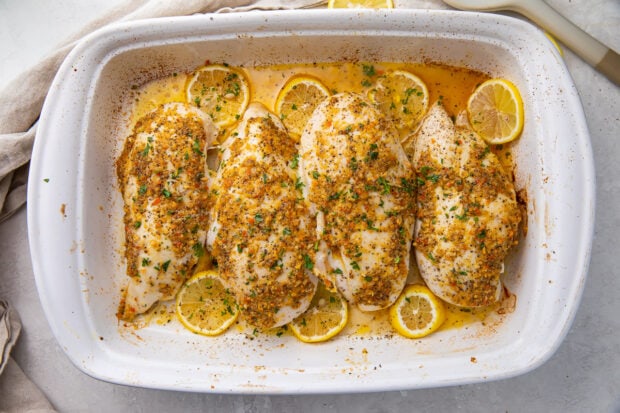 Lemon pepper chicken breasts in a baking dish