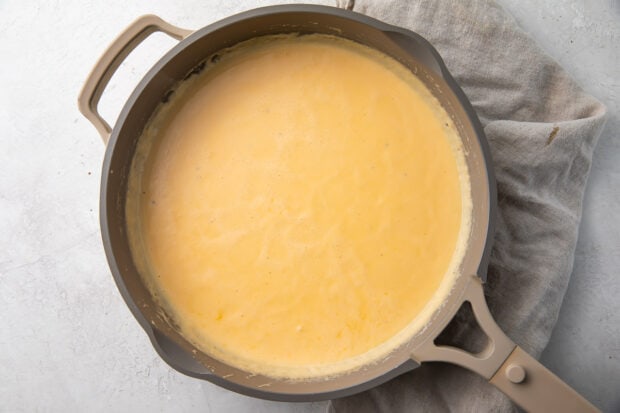 Keto cheese sauce in a saucepan