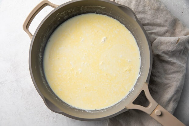 Cream, cream cheese, and butter melted in a saucepan