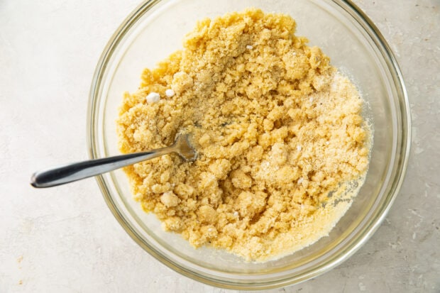 Lemon bar crust dough in a large glass mixing bowl