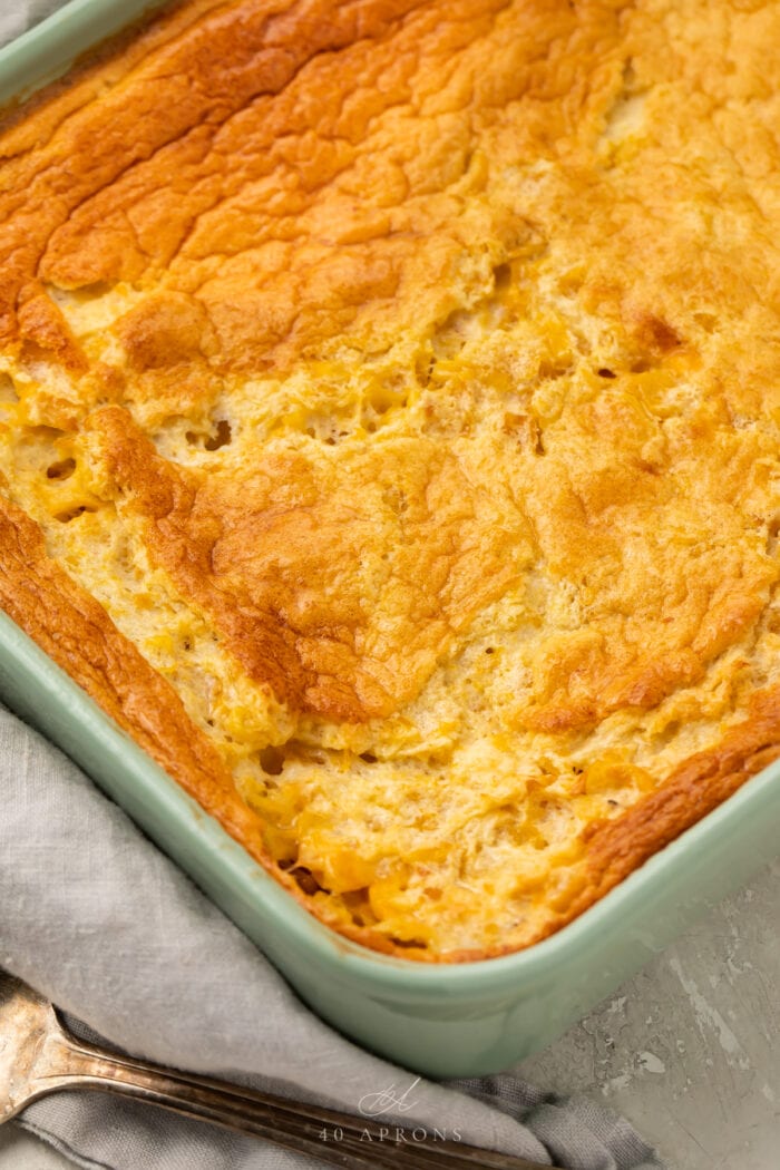 Baked corn souffle in a casserole dish