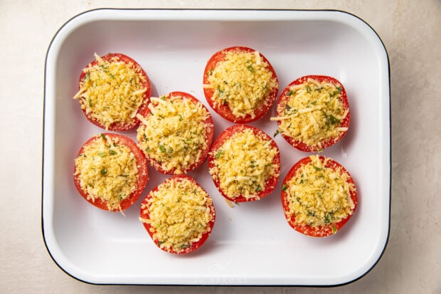 Stuffed tomatoes in baking dish