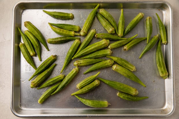 Raw fresh okra on baking sheet