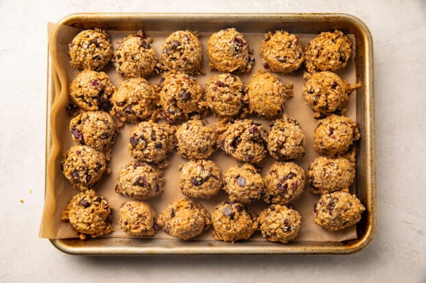 Seed cycling balls on baking sheet