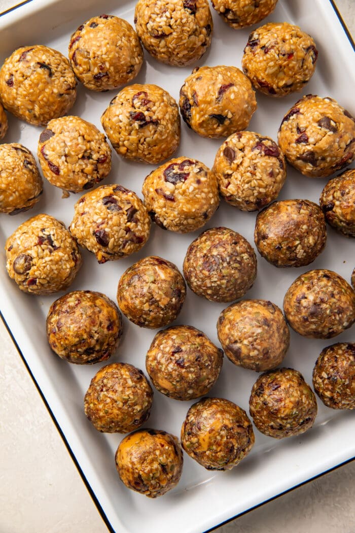 Rows of seed cycling balls in a baking dish