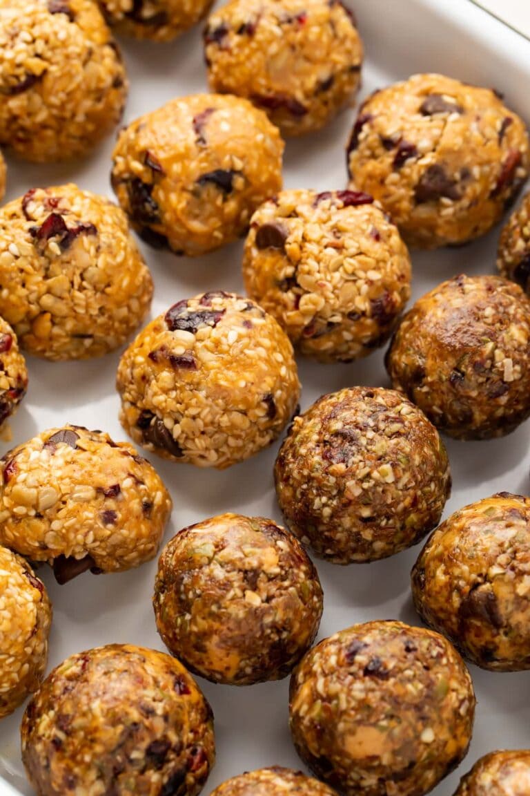 Rows of seed cycling balls on parchment paper