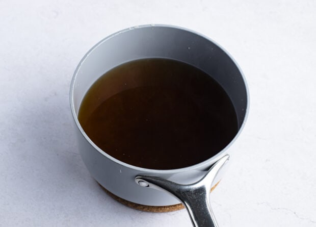 Udon soup broth in large pot