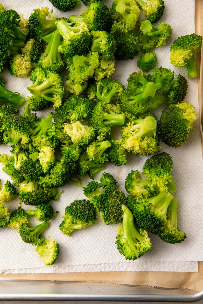 Fresh broccoli after cooking and drying, laying on a paper towel