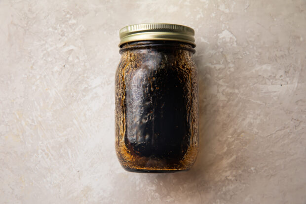 Sweet balsamic vinaigrette in jar with lid