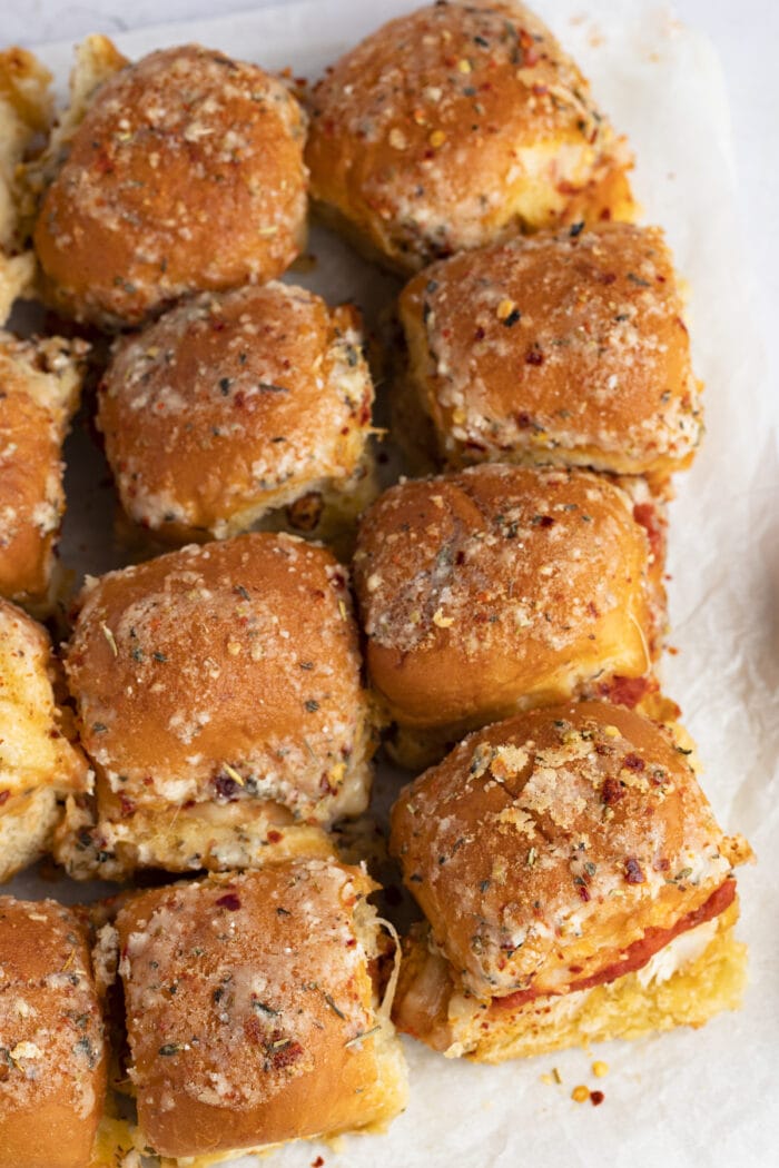 Overhead view of the top buns of the crispy chicken parm sliders