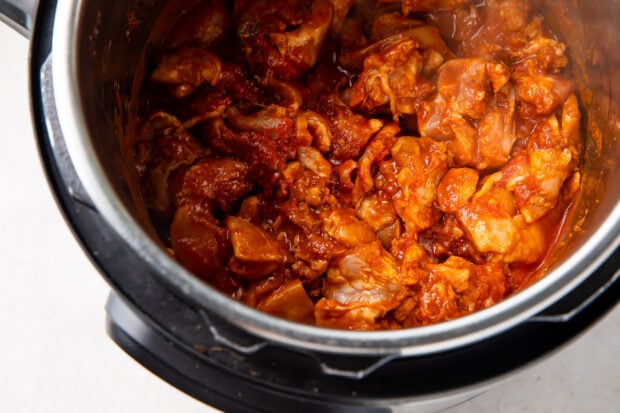 Butter chicken and spices in an Instant Pot