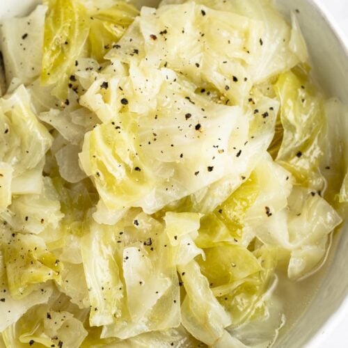 Overhead view of Instant Pot cabbage in a white bowl