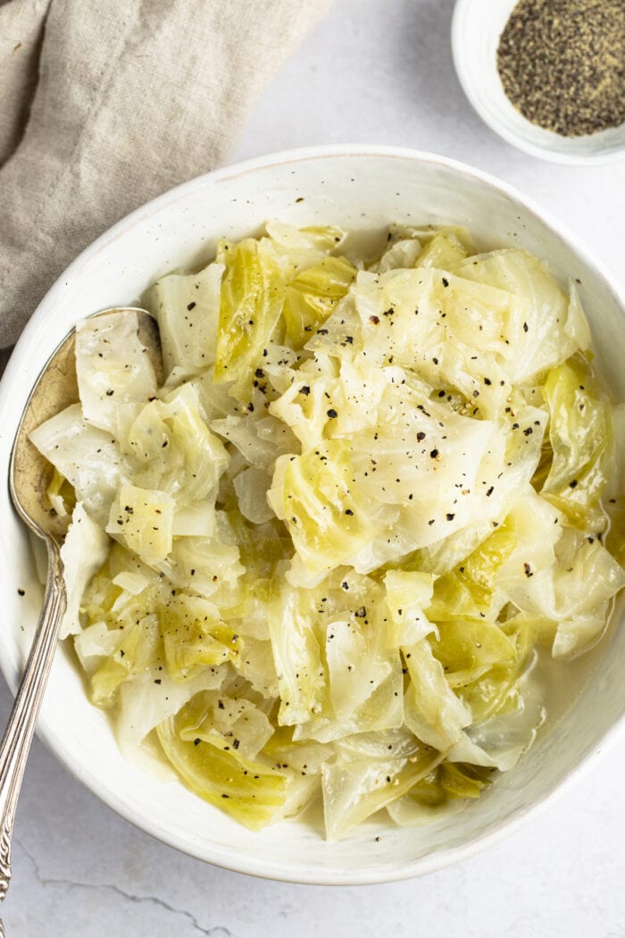 Overhead view of Instant Pot cabbage in a white bowl