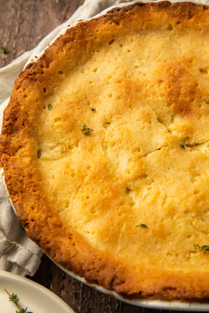 Overhead view of a full keto chicken pot pie in a pie plate